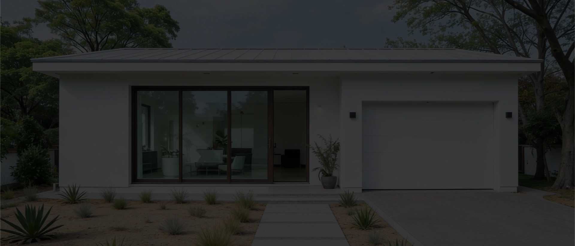 modern single story home exterior with garage in los angeles by Premier Contractor LA
